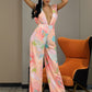 LOVE&amp;LEMONADE Sexy Pink Deep V-Neck High Waist Print Chiffon Horn Shape Jumpsuit LM82918-2
