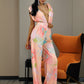 LOVE&amp;LEMONADE Sexy Pink Deep V-Neck High Waist Print Chiffon Horn Shape Jumpsuit LM82918-2